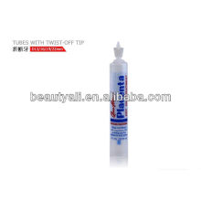 small plastic cosmetic tube with twist-off tip